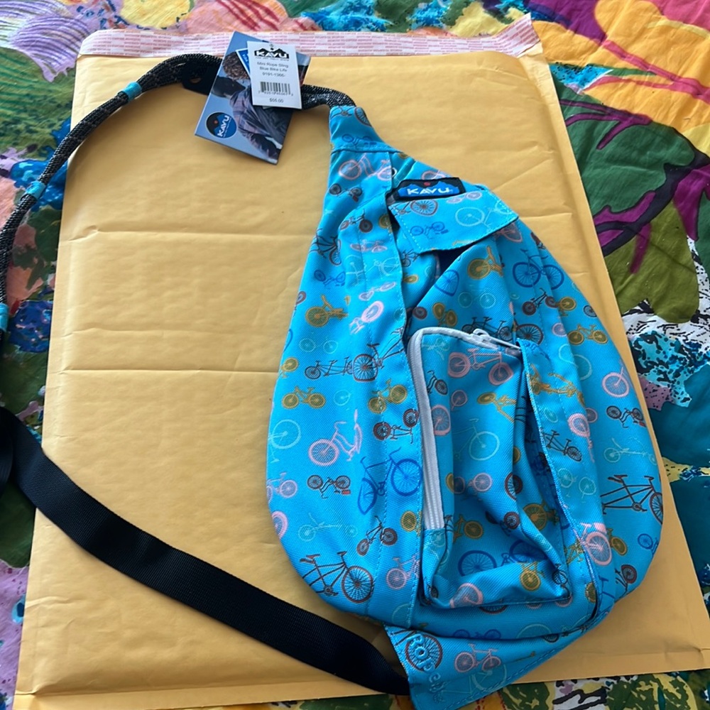 KAVU sling! Never used. Really cute bike print.